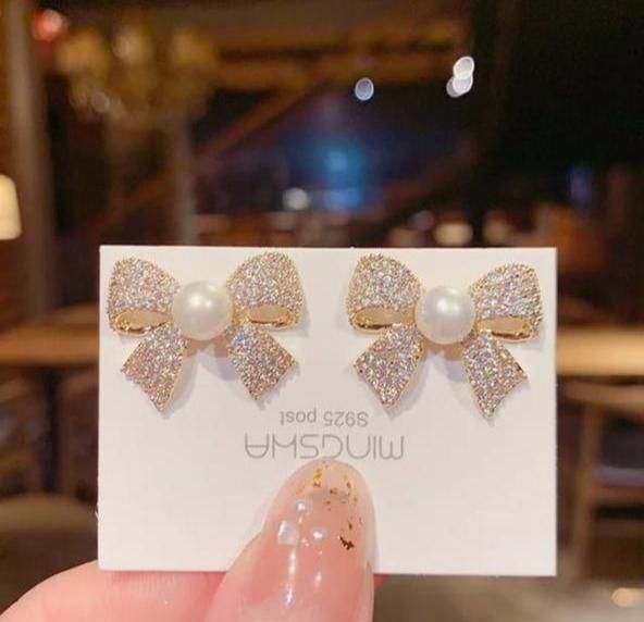 Trending Pearl Bow studs