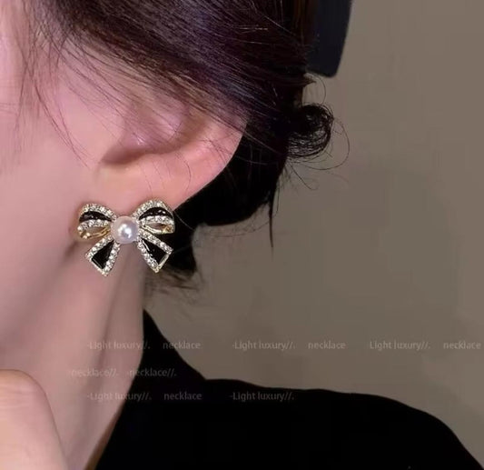Trending Black Bow Studs
