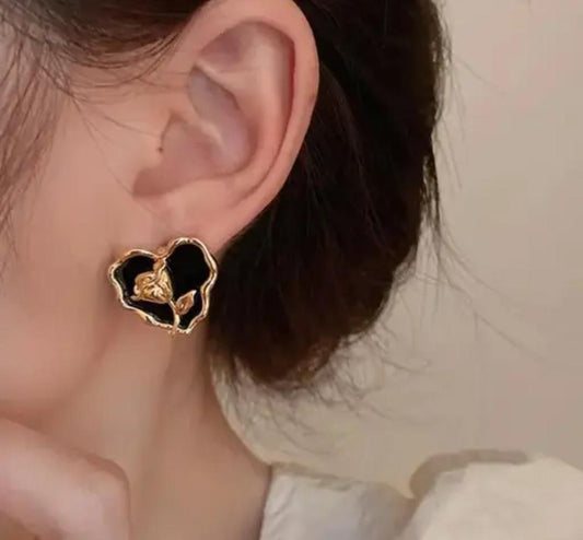 Black Heart With Engraved Flower Earrings